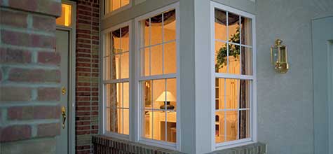 vinyl replacement windows from the outside on a porch