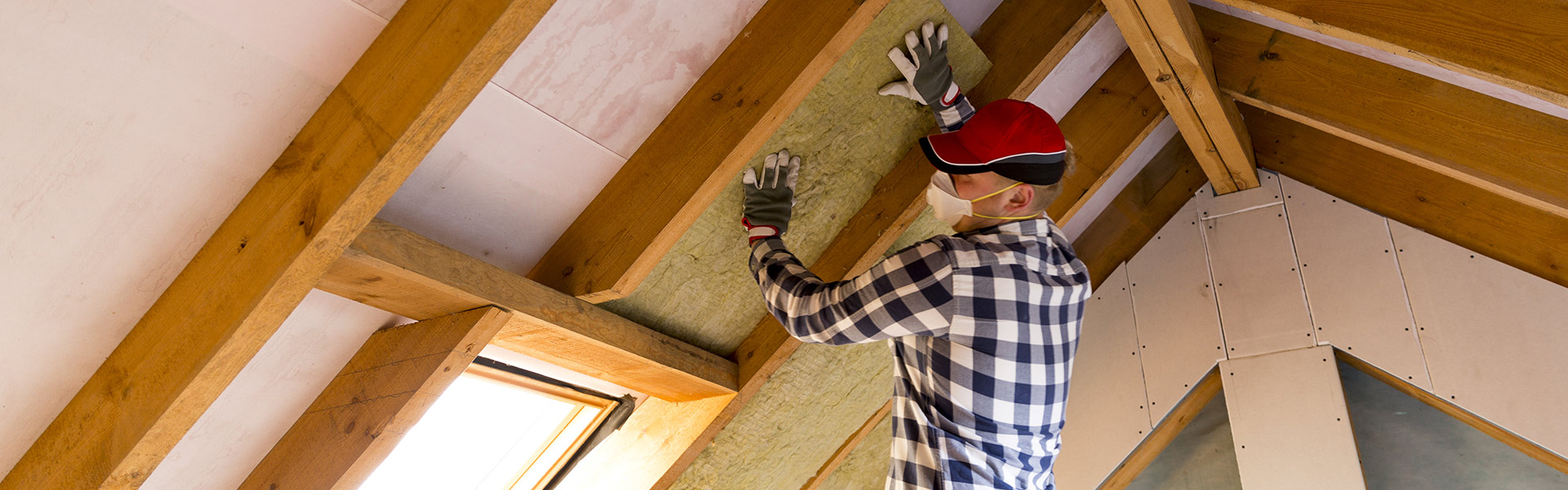 A guy working on insulations
